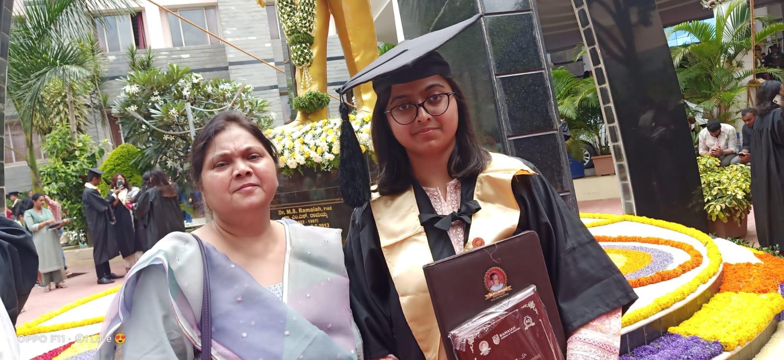 Afrah Alam with her mother on graduation day